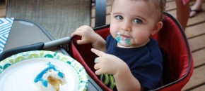 declan with first birthday cake